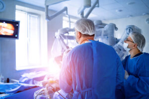 People in operating room doing weight loss surgery on a patient